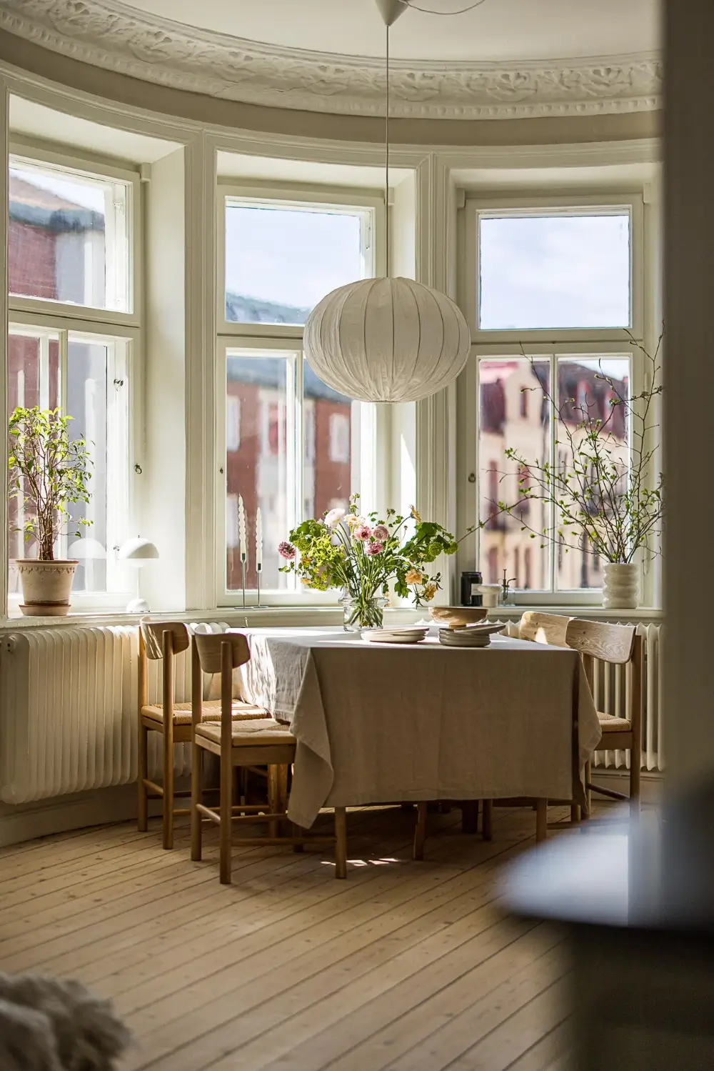 A Green Kitchen, Period Elements, and Jotun Colors in a Small Corner Apartment 2 renovated-late-19th-century-corner-apartment-gothenburg-nordroom