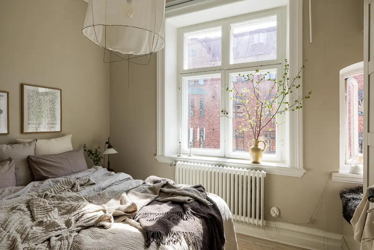 A Green Kitchen, Period Elements, and Jotun Colors in a Small Corner Apartment 17 renovated-late-19th-century-corner-apartment-gothenburg-nordroom