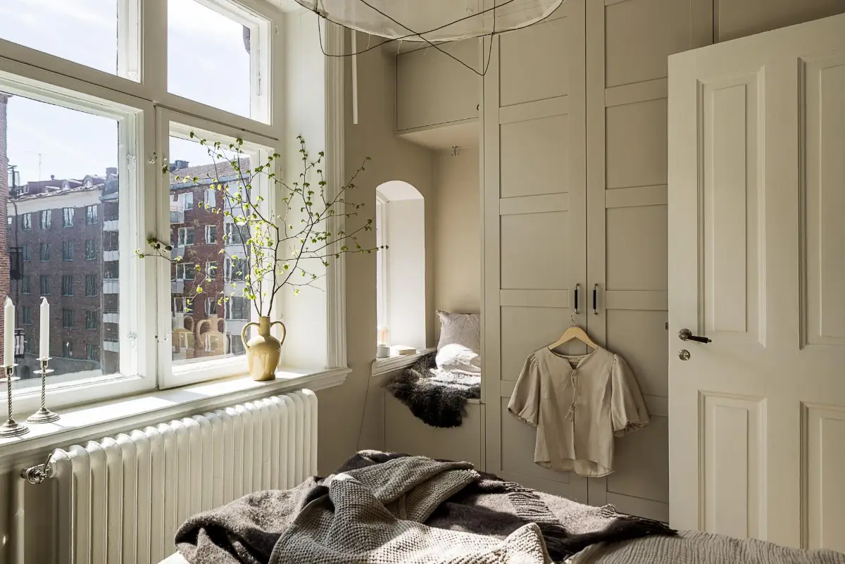 A Green Kitchen, Period Elements, and Jotun Colors in a Small Corner Apartment 18 renovated-late-19th-century-corner-apartment-gothenburg-nordroom