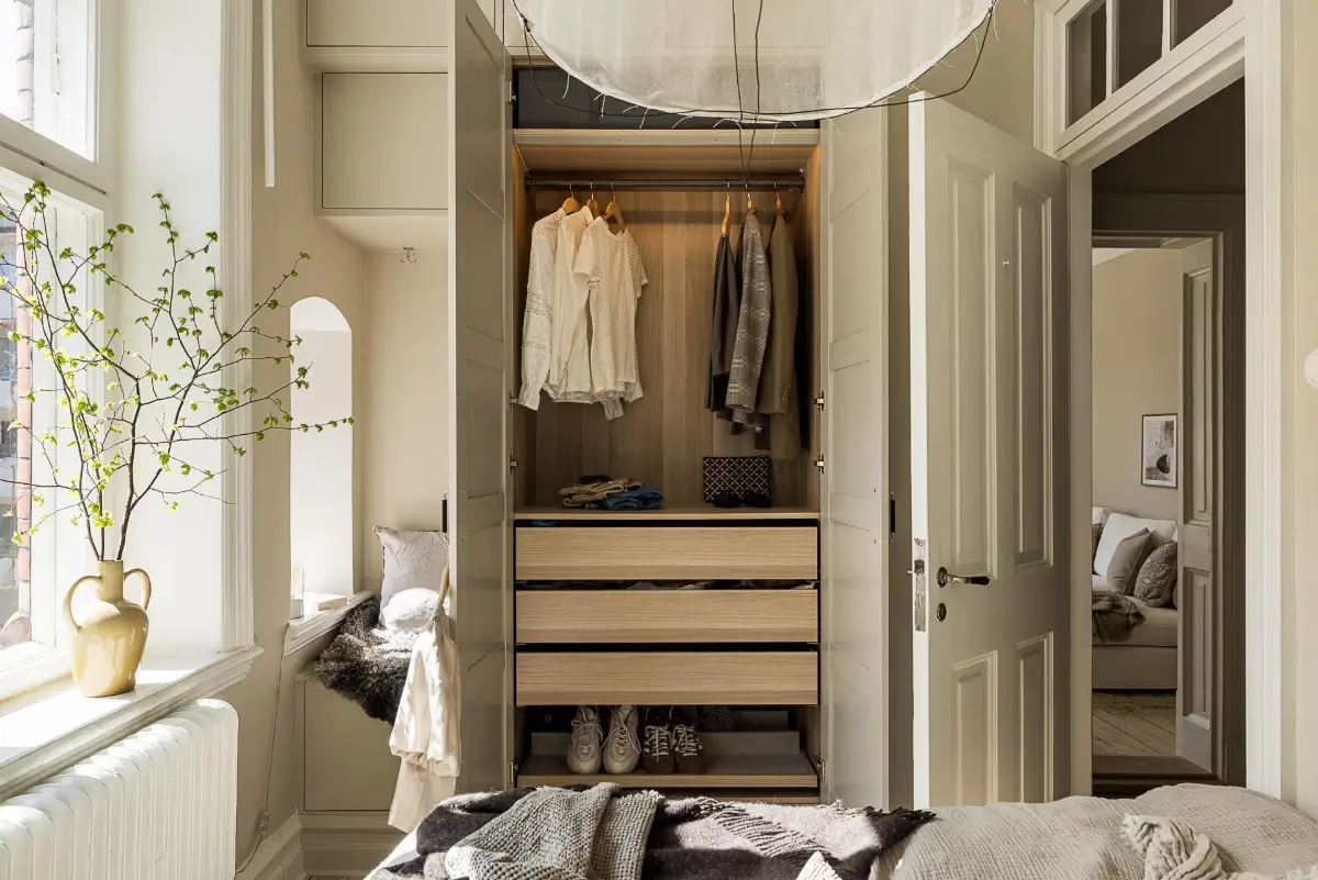 A Green Kitchen, Period Elements, and Jotun Colors in a Small Corner Apartment 22 renovated-late-19th-century-corner-apartment-gothenburg-nordroom