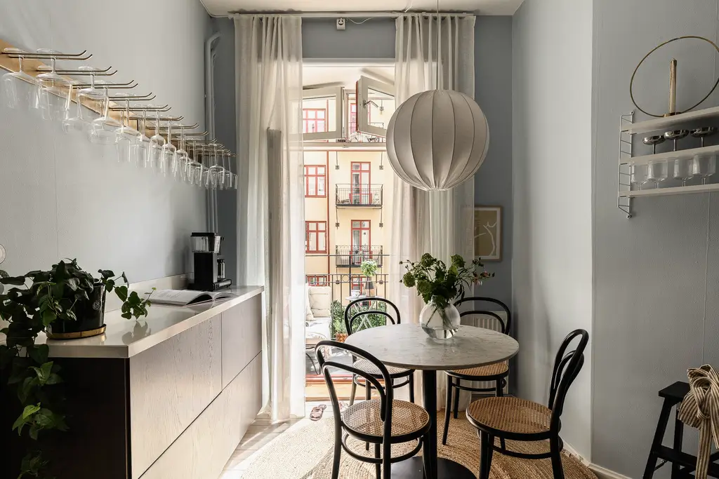 Soft Blue walls and a Spacious Kitchen in a Swedish Studio Apartment 13 turn-of-the-century-studio-apartment-spacious-kitchen-nordroom