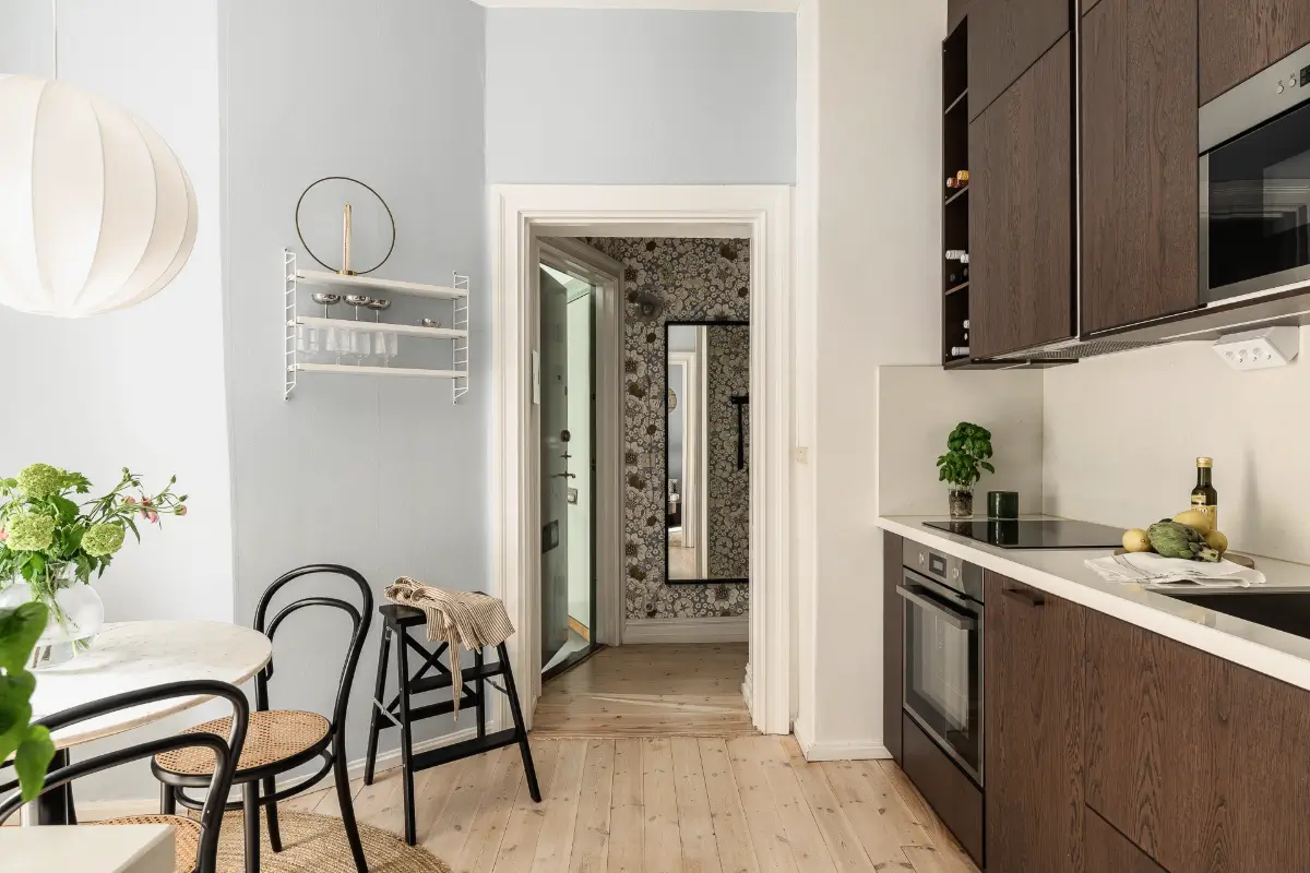 Soft Blue walls and a Spacious Kitchen in a Swedish Studio Apartment 20 turn-of-the-century-studio-apartment-spacious-kitchen-nordroom