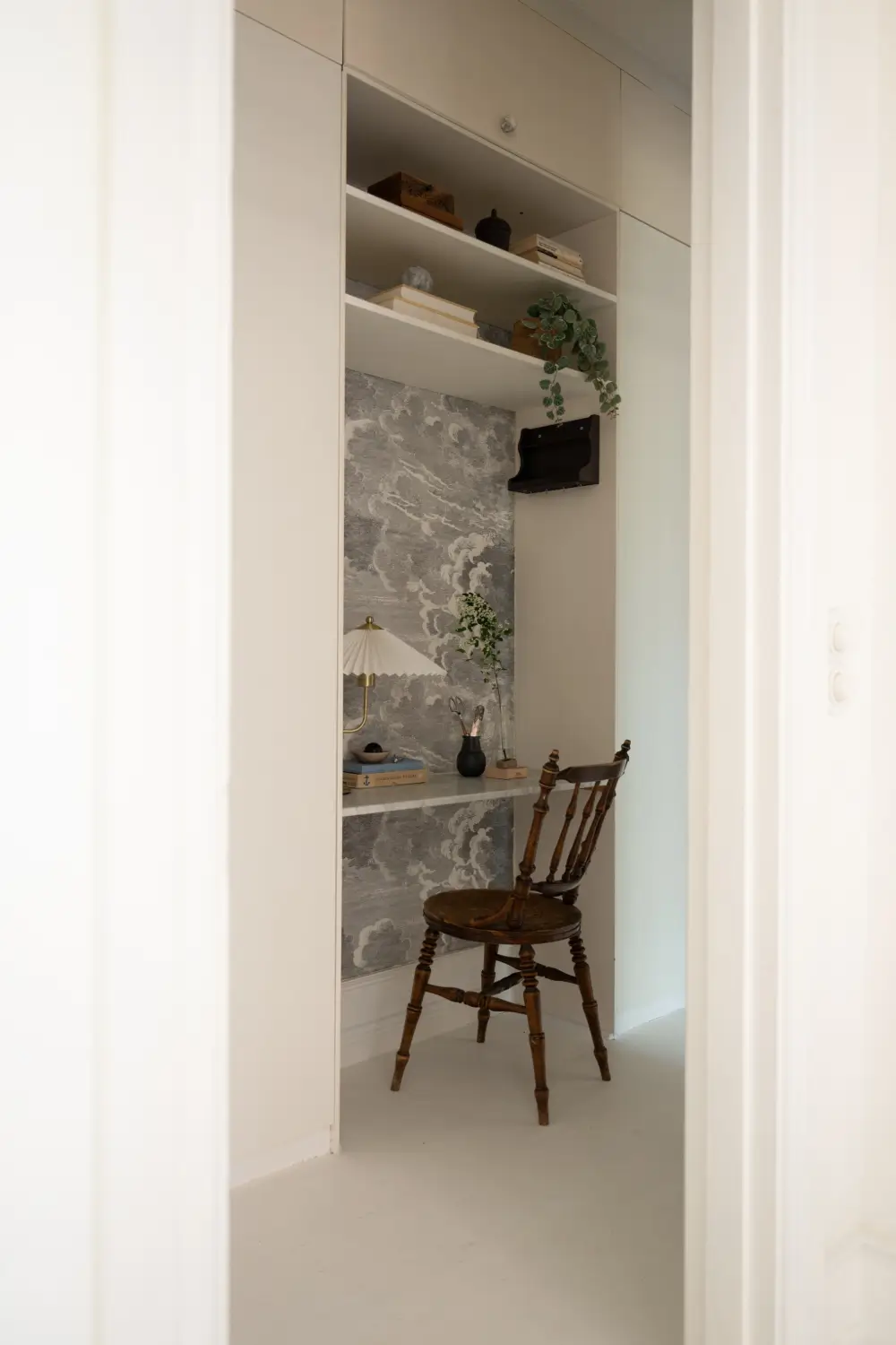 An Elegant Stockholm Apartment Blends Modern Elements with Period Features 27 bright-studio-apartment-industrial-glass-room-divider-lush-balcony