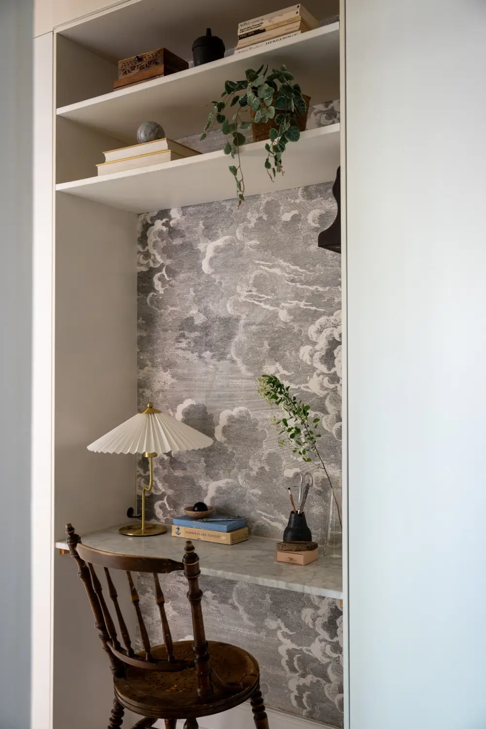 An Elegant Stockholm Apartment Blends Modern Elements with Period Features 29 bright-studio-apartment-industrial-glass-room-divider-lush-balcony