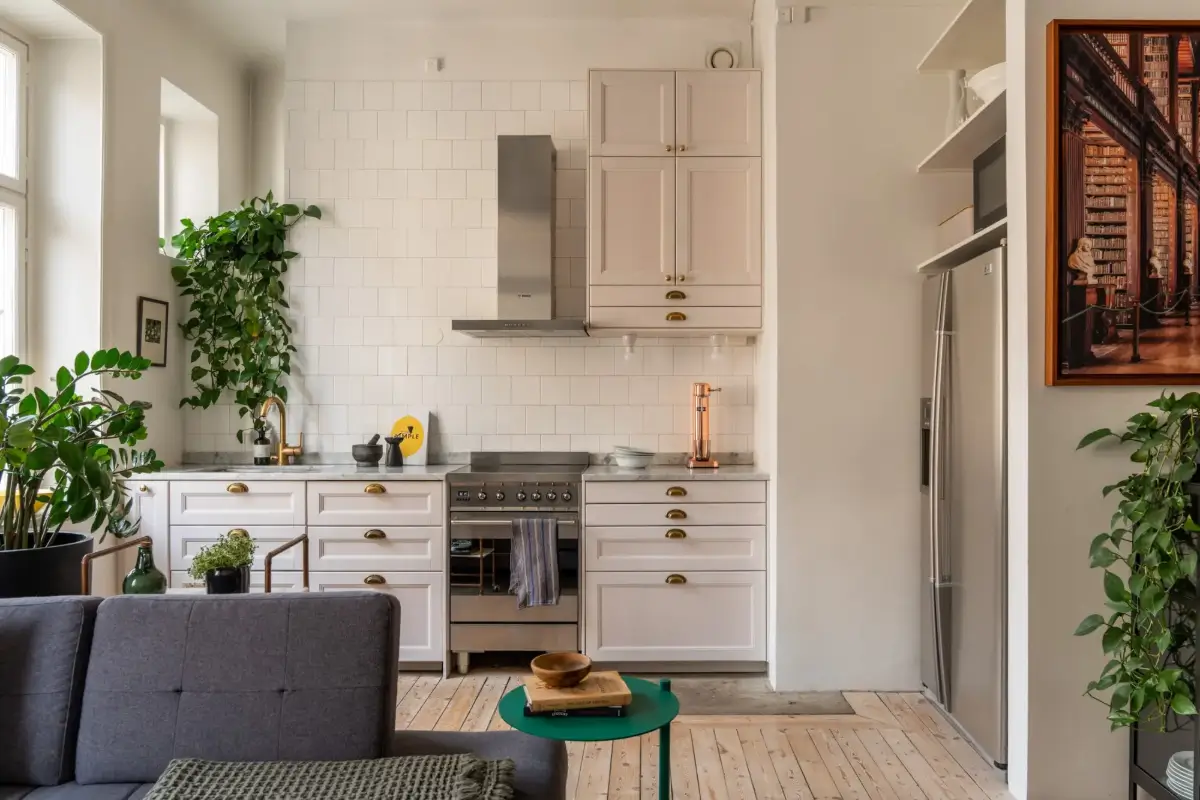 A Social Living Space and an Exposed Brick Wall in a Stockholm Apartment 12 classic-turn-of-the-century-stockholm-apartment-nordroom
