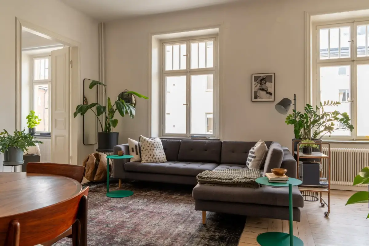 A Social Living Space and an Exposed Brick Wall in a Stockholm Apartment 14 classic-turn-of-the-century-stockholm-apartment-nordroom