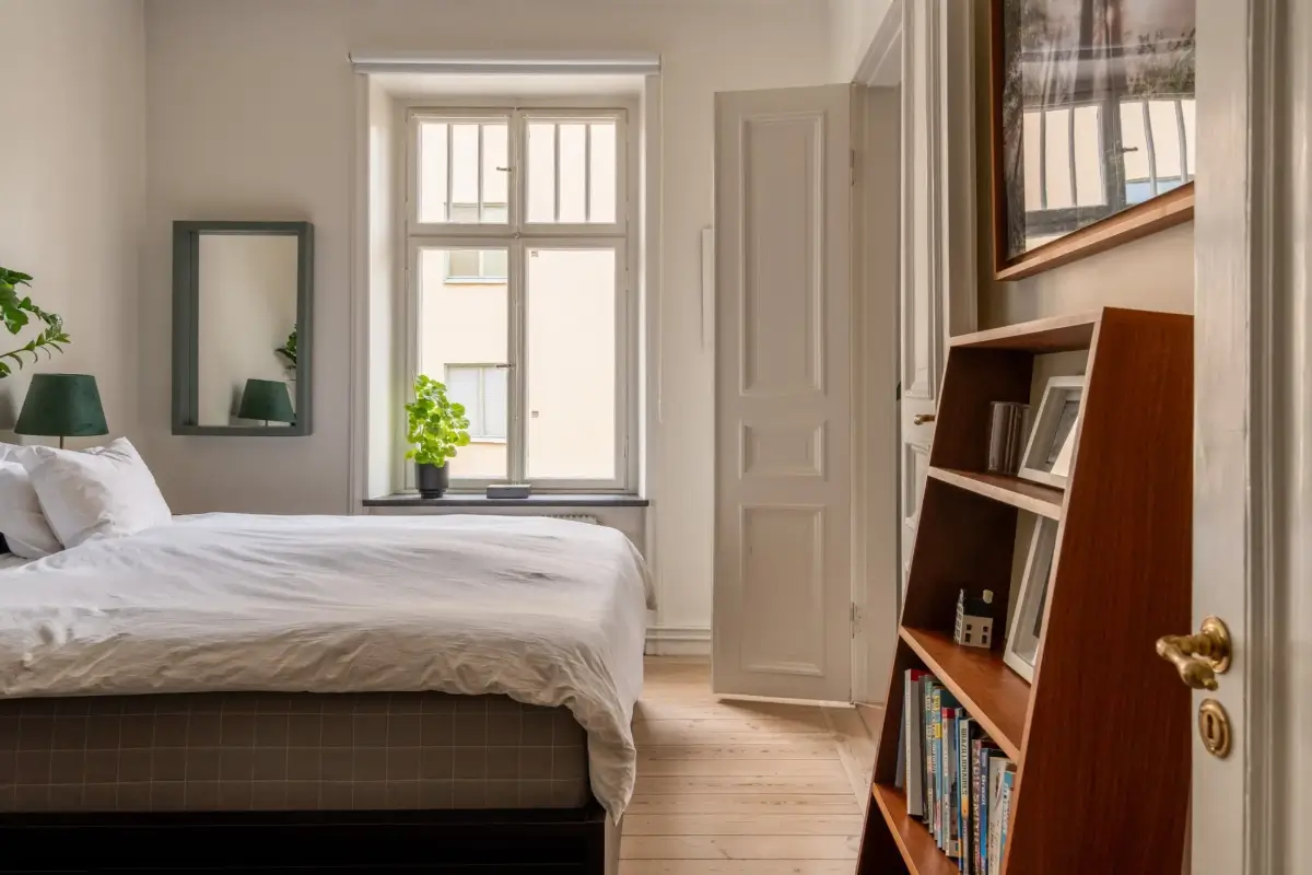 A Social Living Space and an Exposed Brick Wall in a Stockholm Apartment 17 classic-turn-of-the-century-stockholm-apartment-nordroom