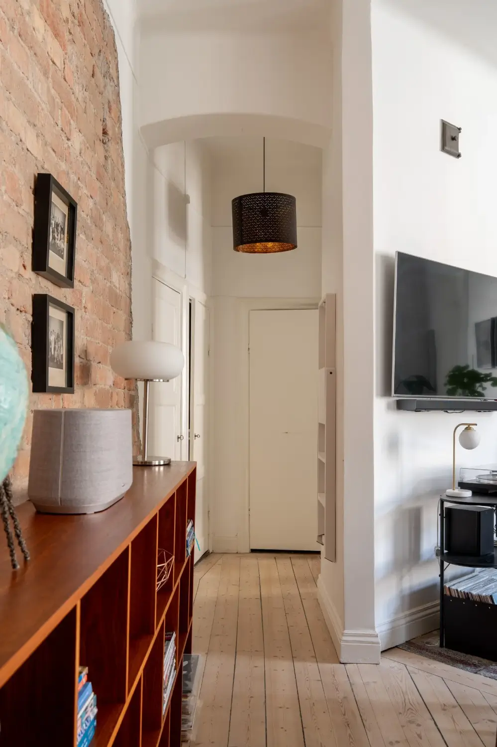 A Social Living Space and an Exposed Brick Wall in a Stockholm Apartment 20 classic-turn-of-the-century-stockholm-apartment-nordroom