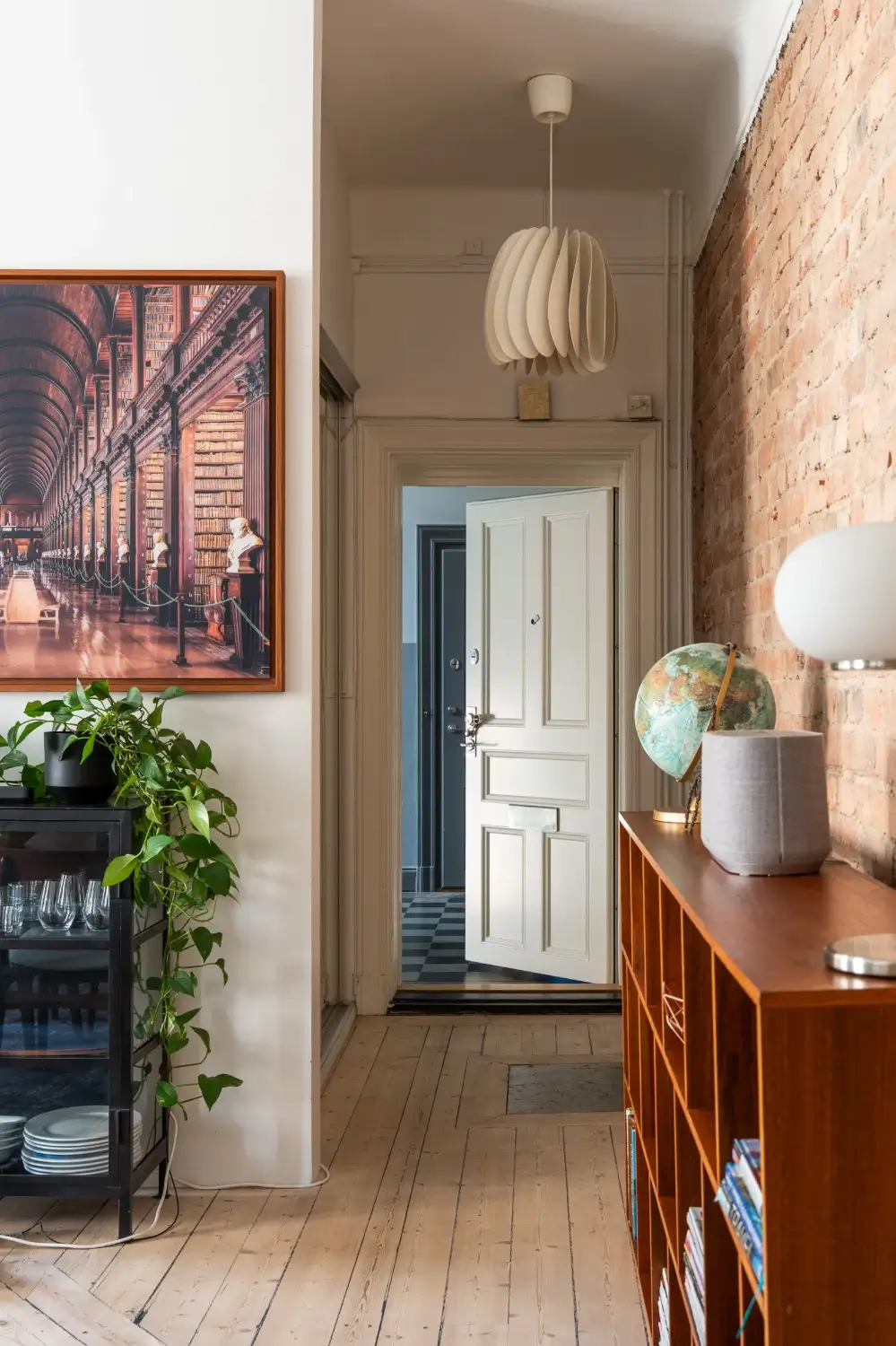 A Social Living Space and an Exposed Brick Wall in a Stockholm Apartment 22 classic-turn-of-the-century-stockholm-apartment-nordroom