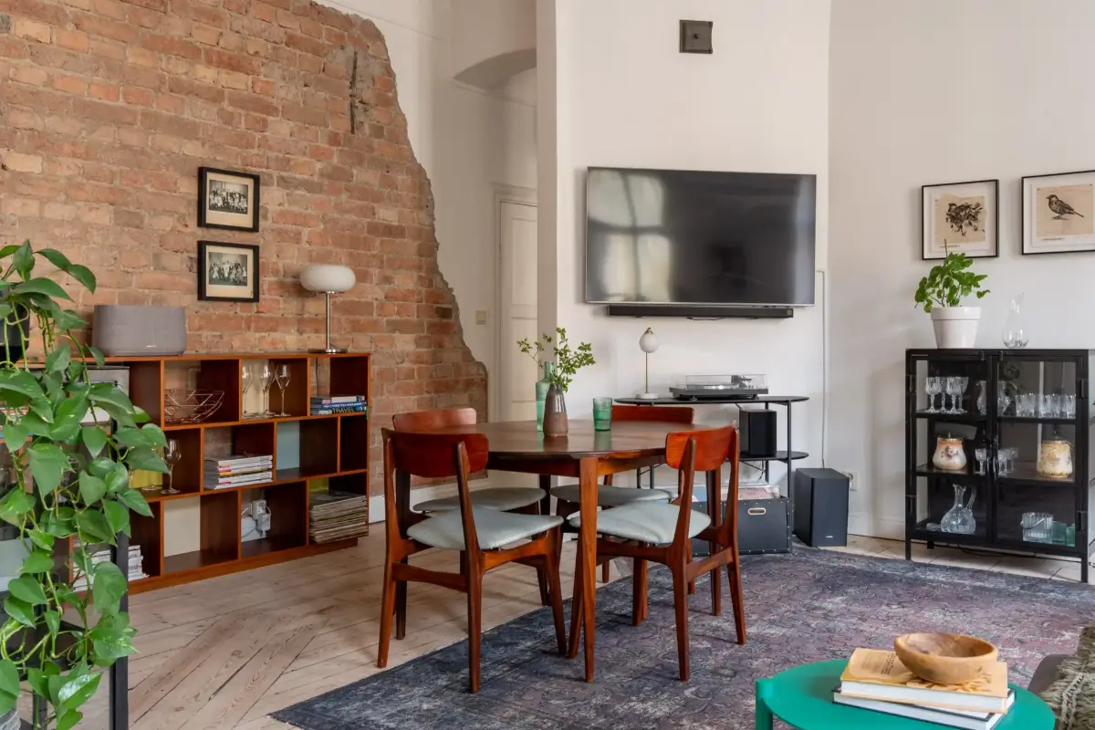 A Social Living Space and an Exposed Brick Wall in a Stockholm Apartment 5 classic-turn-of-the-century-stockholm-apartment-nordroom