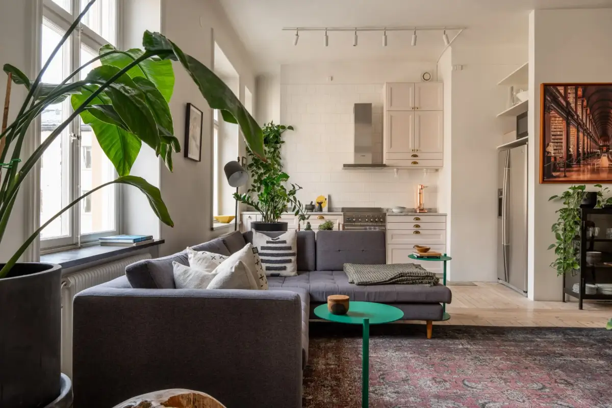 A Social Living Space and an Exposed Brick Wall in a Stockholm Apartment 8 classic-turn-of-the-century-stockholm-apartment-nordroom