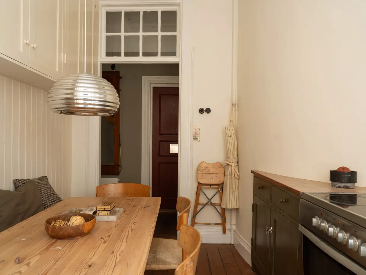 Dark Oiled Floorboards and Muted Tones Turn This Apartment Into a Warm Home 14 cozy-stockholm-apartment-green-accents-nordroom