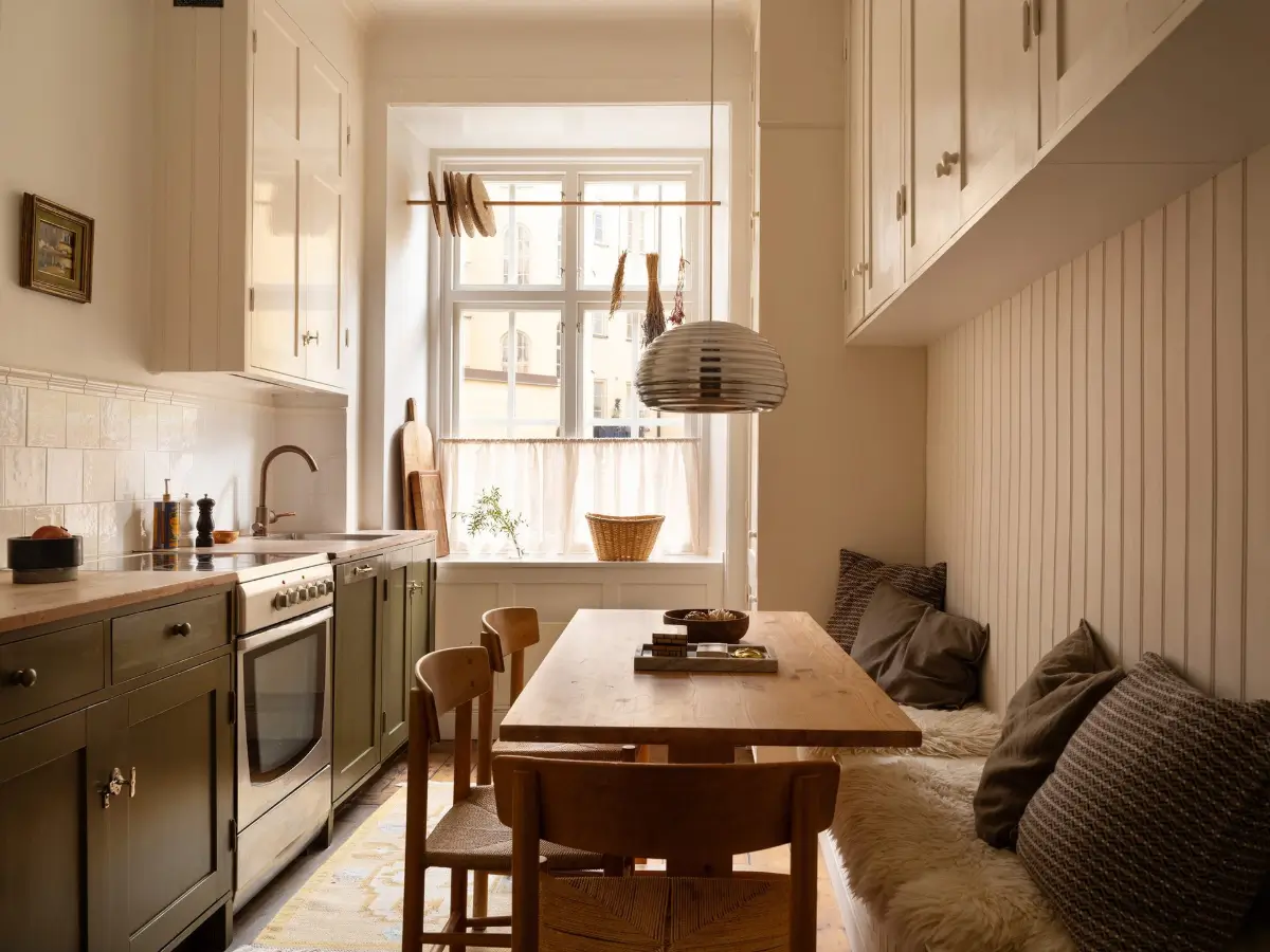 Dark Oiled Floorboards and Muted Tones Turn This Apartment Into a Warm Home 7 cozy-stockholm-apartment-green-accents-nordroom