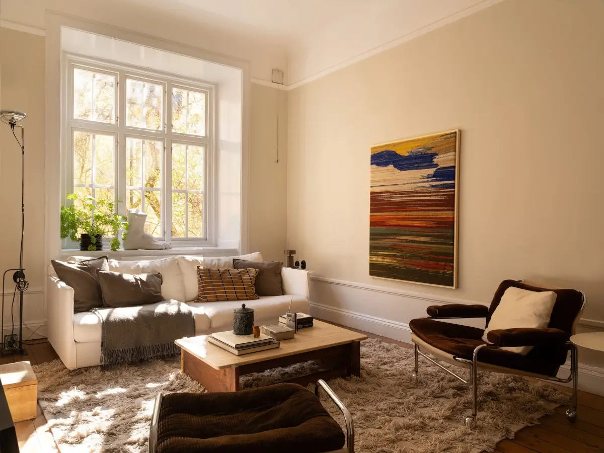 Dark Oiled Floorboards and Muted Tones Turn This Apartment Into a Warm Home 1 cozy-stockholm-apartment-green-accents-nordroom