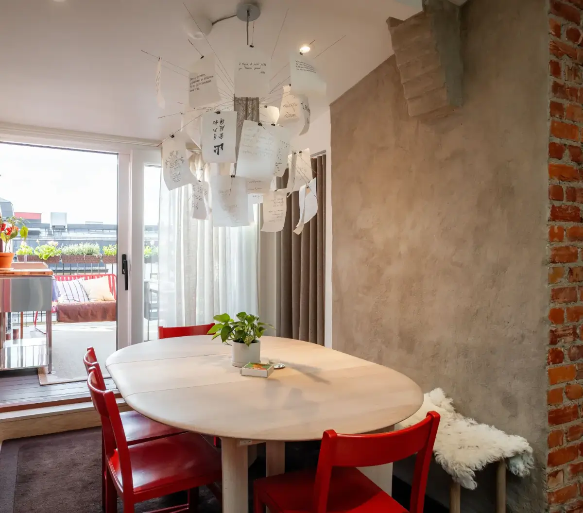 Red Color Pops in a Unique Designer Attic Apartment in Sweden 12 red-accents-designer-kitchen-attic-apartment-sweden-nordroom