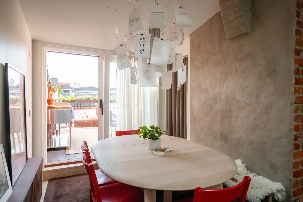 Red Color Pops in a Unique Designer Attic Apartment in Sweden 14 red-accents-designer-kitchen-attic-apartment-sweden-nordroom
