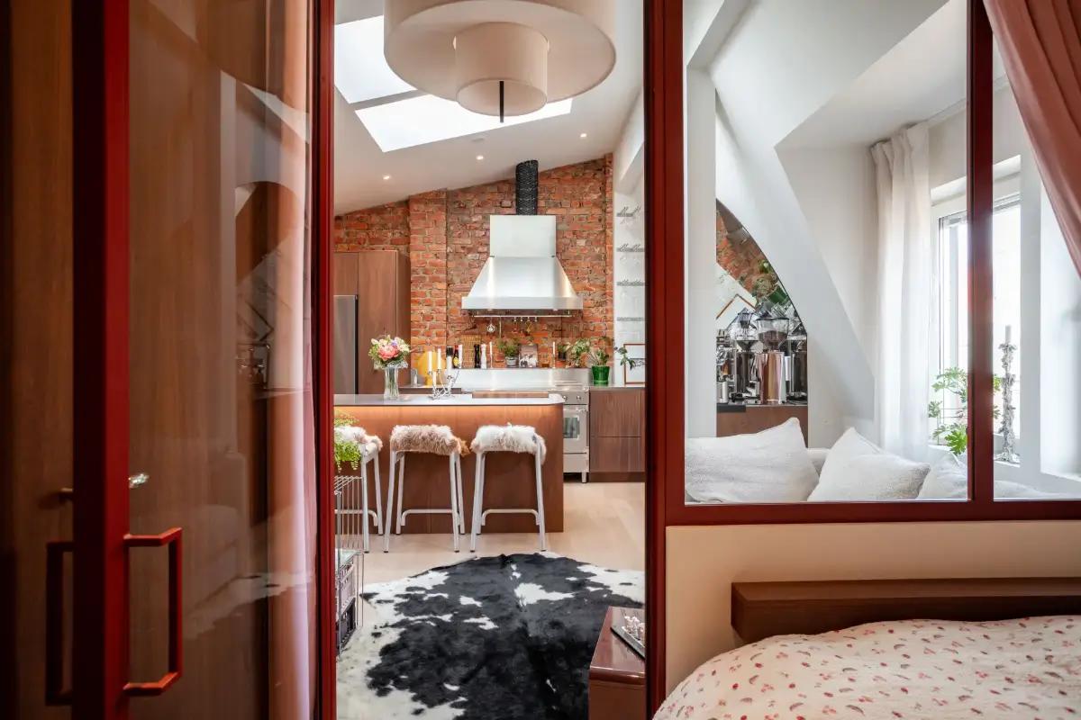 Red Color Pops in a Unique Designer Attic Apartment in Sweden 29 red-accents-designer-kitchen-attic-apartment-sweden-nordroom