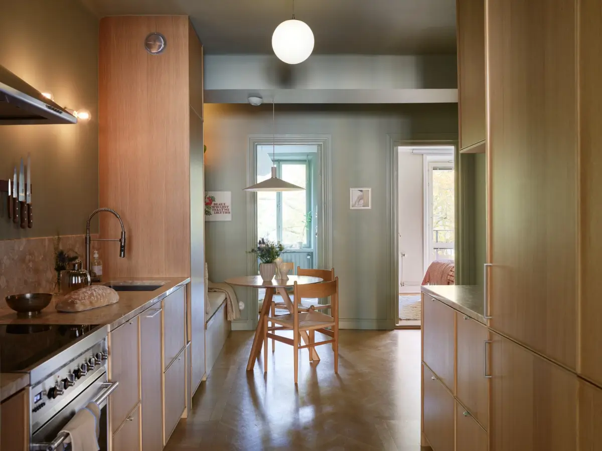 An Oak and Green Kitchen is the Heart of This Stockholm Apartment 5 renovated-stockholm-apartment-central-oak-kitchen-nordroom