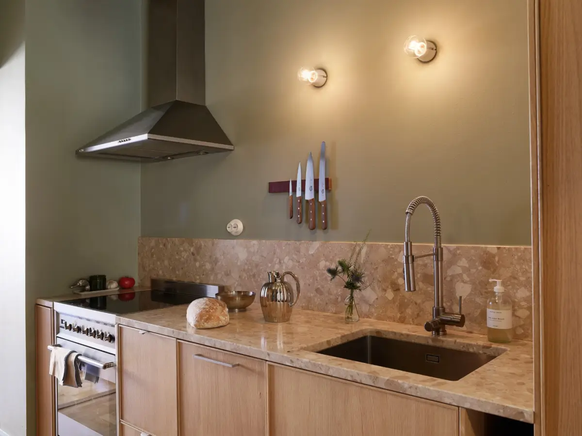 An Oak and Green Kitchen is the Heart of This Stockholm Apartment 4 renovated-stockholm-apartment-central-oak-kitchen-nordroom