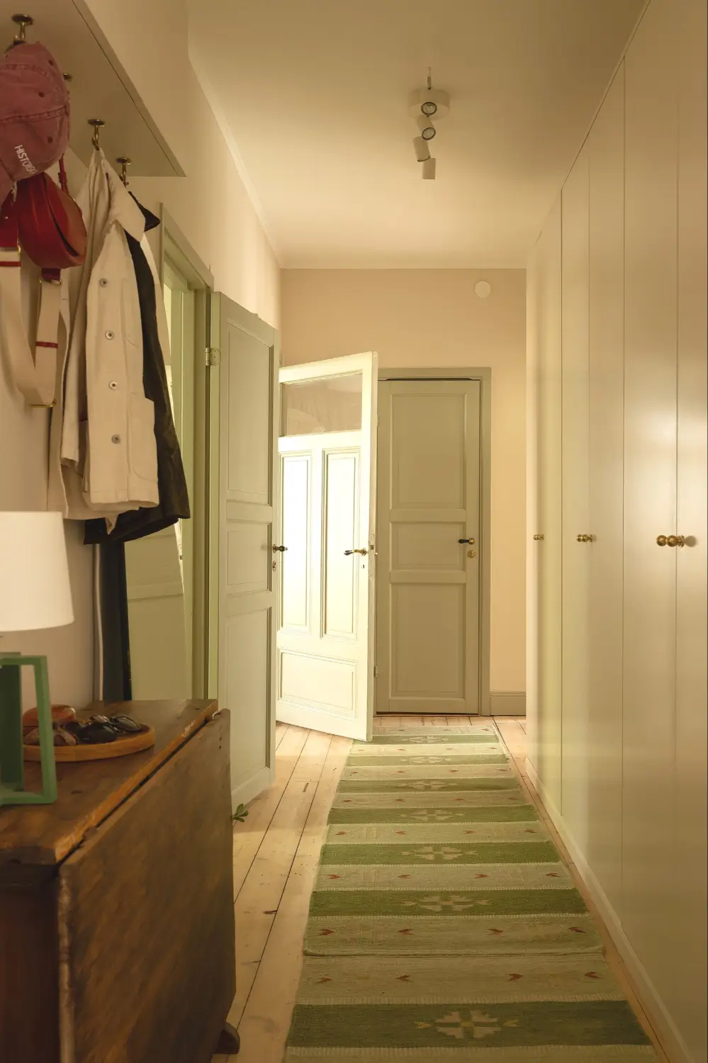 A Muted Green Palette and Period Features in Stockholm 31 sage-green-palette-late-19th-century-apartment-stockholm-nordroom