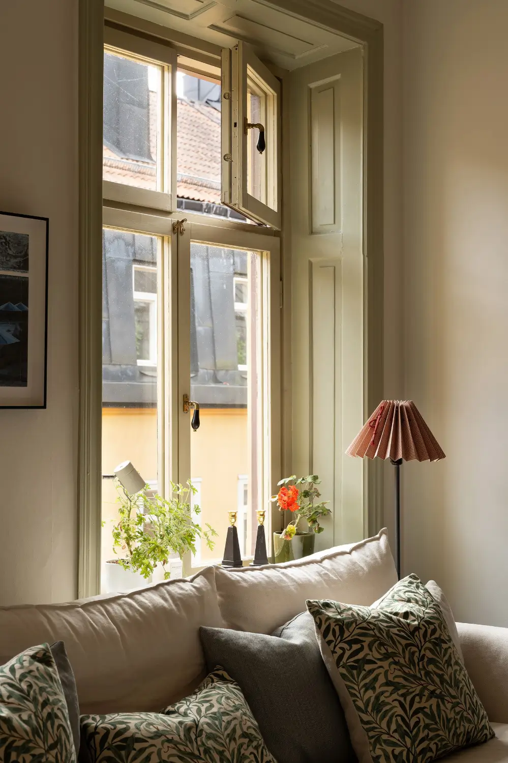 A Muted Green Palette and Period Features in Stockholm 7 sage-green-palette-late-19th-century-apartment-stockholm-nordroom