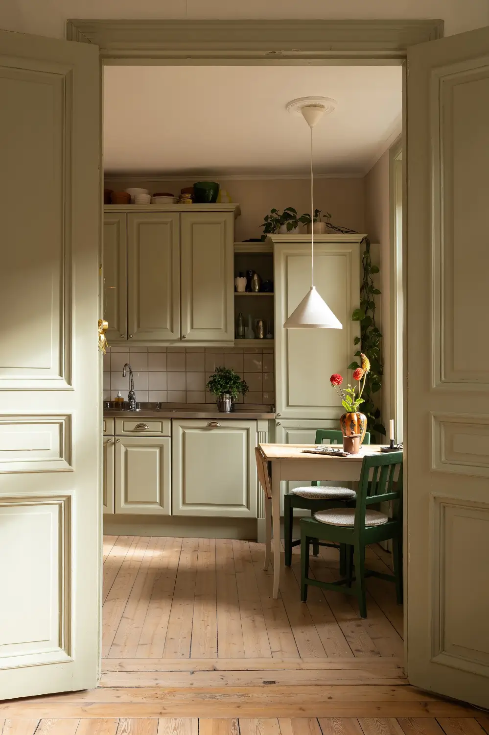 A Muted Green Palette and Period Features in Stockholm 16 sage-green-palette-late-19th-century-apartment-stockholm-nordroom