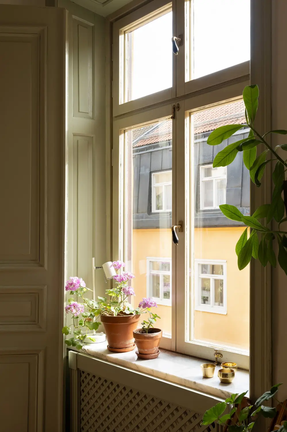 A Muted Green Palette and Period Features in Stockholm 15 sage-green-palette-late-19th-century-apartment-stockholm-nordroom