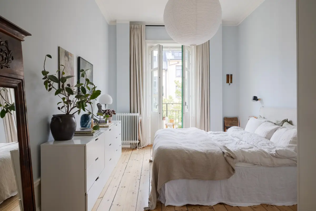 A Light Blue Bedroom in a Light-Filled Turn-of-the-Century Apartment 19 turn-of-the-century-apartment-pale-blue-bedroom-nordroom