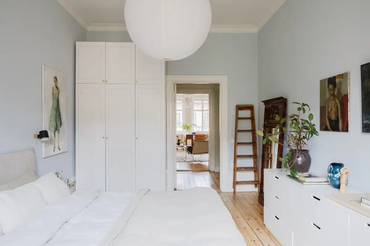 A Light Blue Bedroom in a Light-Filled Turn-of-the-Century Apartment 27 turn-of-the-century-apartment-pale-blue-bedroom-nordroom