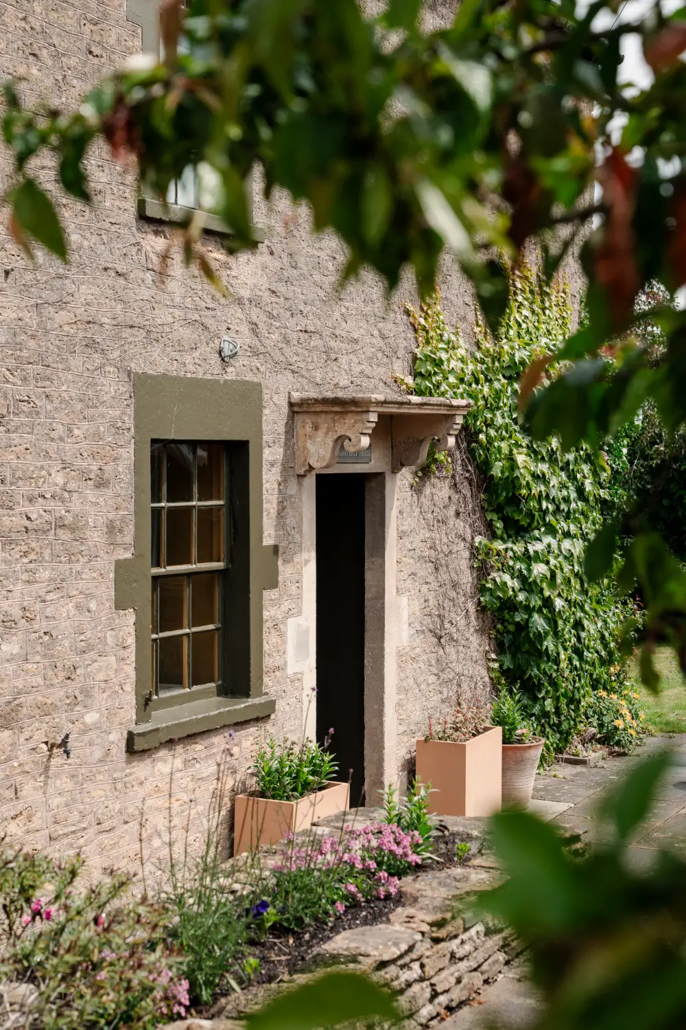 A Traditional Stone Cottage with a Black Timber Extension and Colorful Interiors 33 colorful-rubble-stone-cottage-wooden-extension-somerset