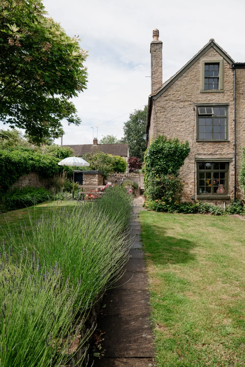 A Traditional Stone Cottage with a Black Timber Extension and Colorful Interiors 29 colorful-rubble-stone-cottage-wooden-extension-somerset