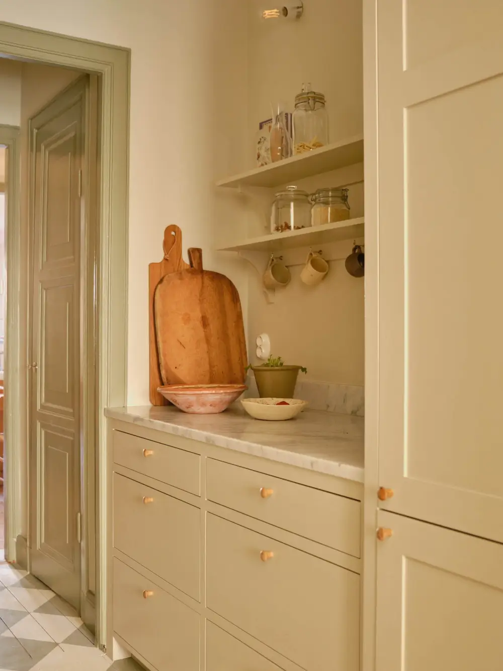 A Soothing Beige and Green Color Palette in a Stockholm Apartment 23 beige-green-color-palette-renovated-1920s-apartment-nordroom
