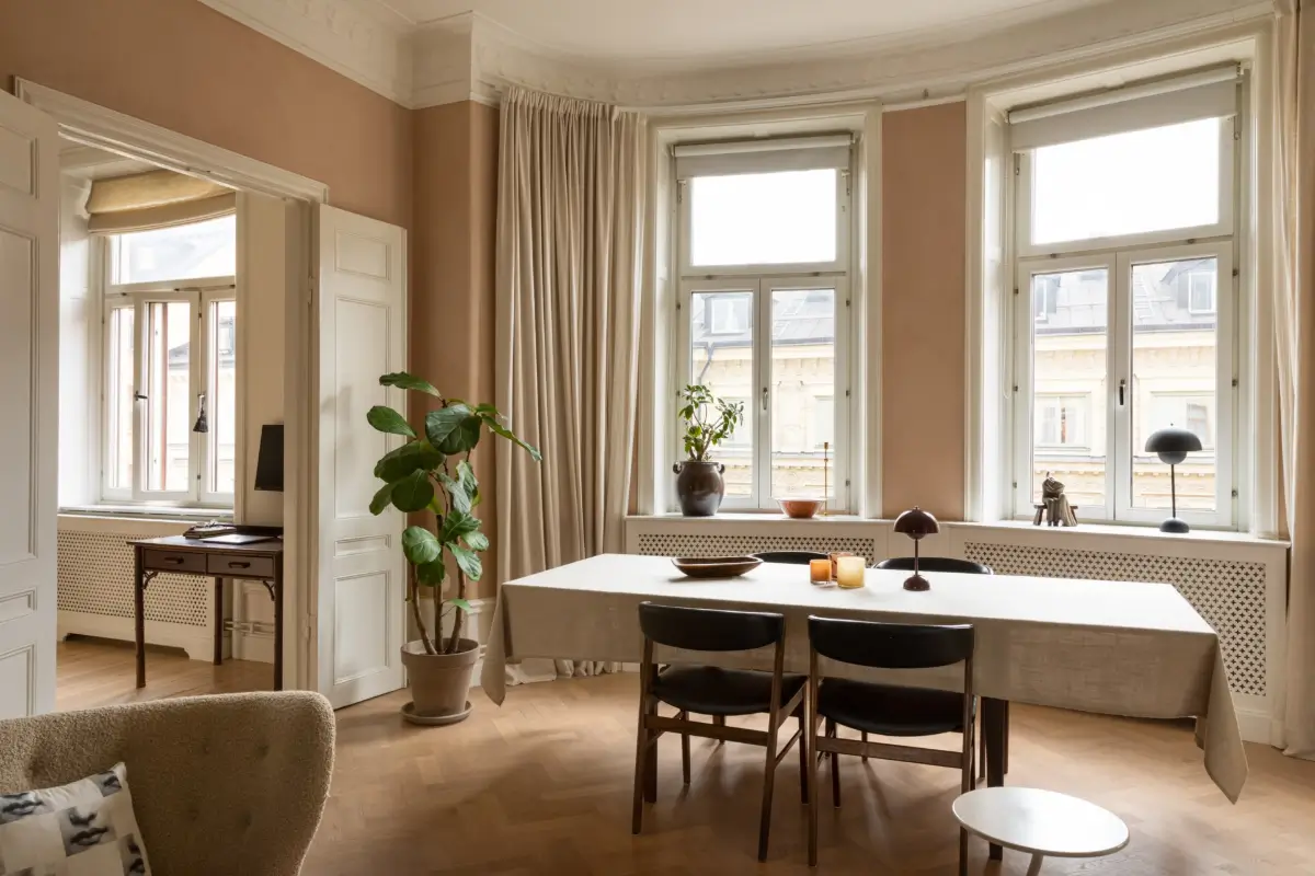 A Rich Burgundy Hall in a Stylishly Renovated Stockholm Apartment 2 butter-yellow-kitchen-period-character-stockholm-apartment-nordroom