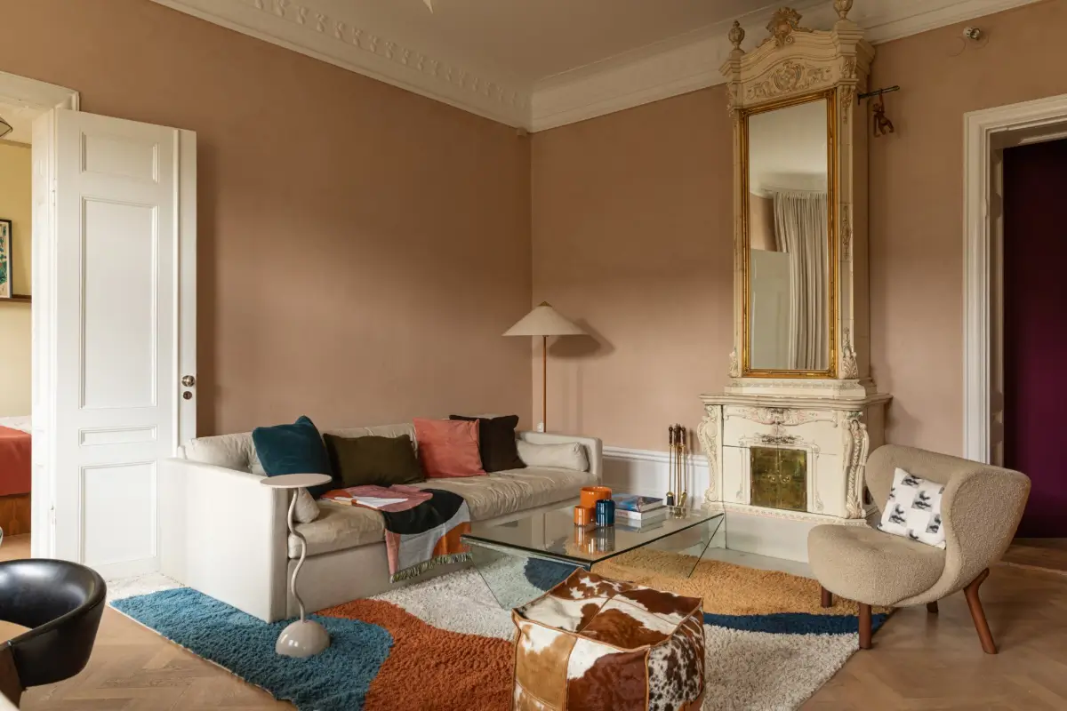 A Rich Burgundy Hall in a Stylishly Renovated Stockholm Apartment 1 butter-yellow-kitchen-period-character-stockholm-apartment-nordroom