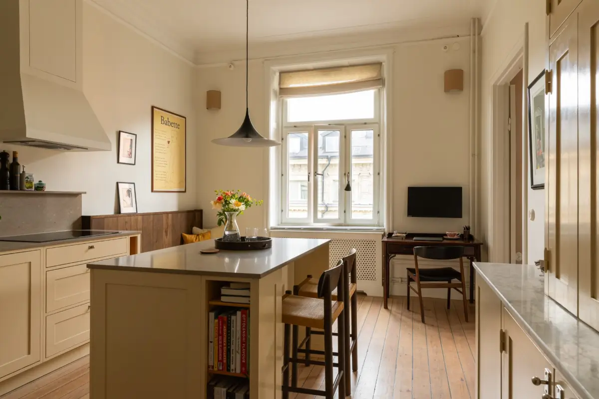 A Rich Burgundy Hall in a Stylishly Renovated Stockholm Apartment 13 butter-yellow-kitchen-period-character-stockholm-apartment-nordroom