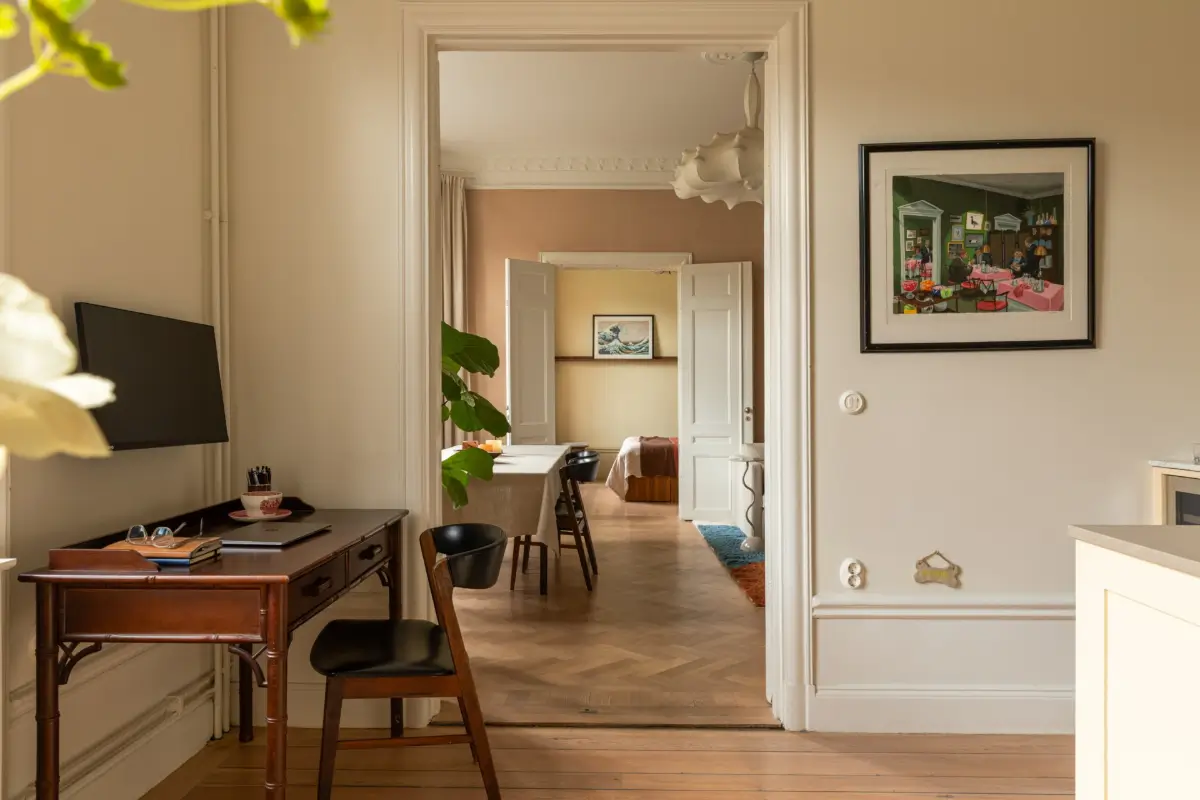 A Rich Burgundy Hall in a Stylishly Renovated Stockholm Apartment 21 butter-yellow-kitchen-period-character-stockholm-apartment-nordroom