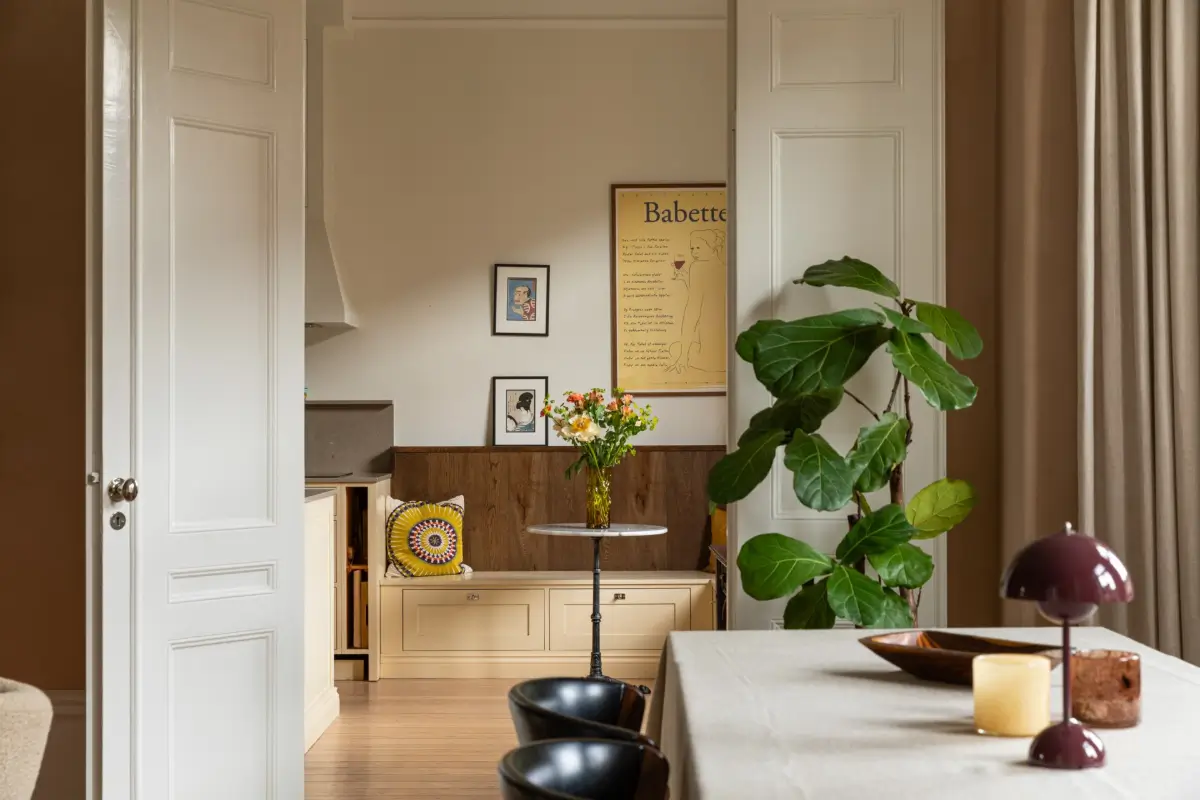 A Rich Burgundy Hall in a Stylishly Renovated Stockholm Apartment 9 butter-yellow-kitchen-period-character-stockholm-apartment-nordroom
