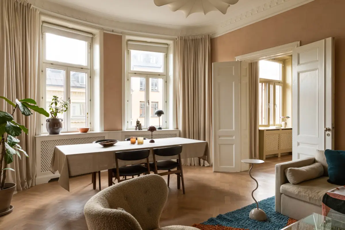 A Rich Burgundy Hall in a Stylishly Renovated Stockholm Apartment 3 butter-yellow-kitchen-period-character-stockholm-apartment-nordroom