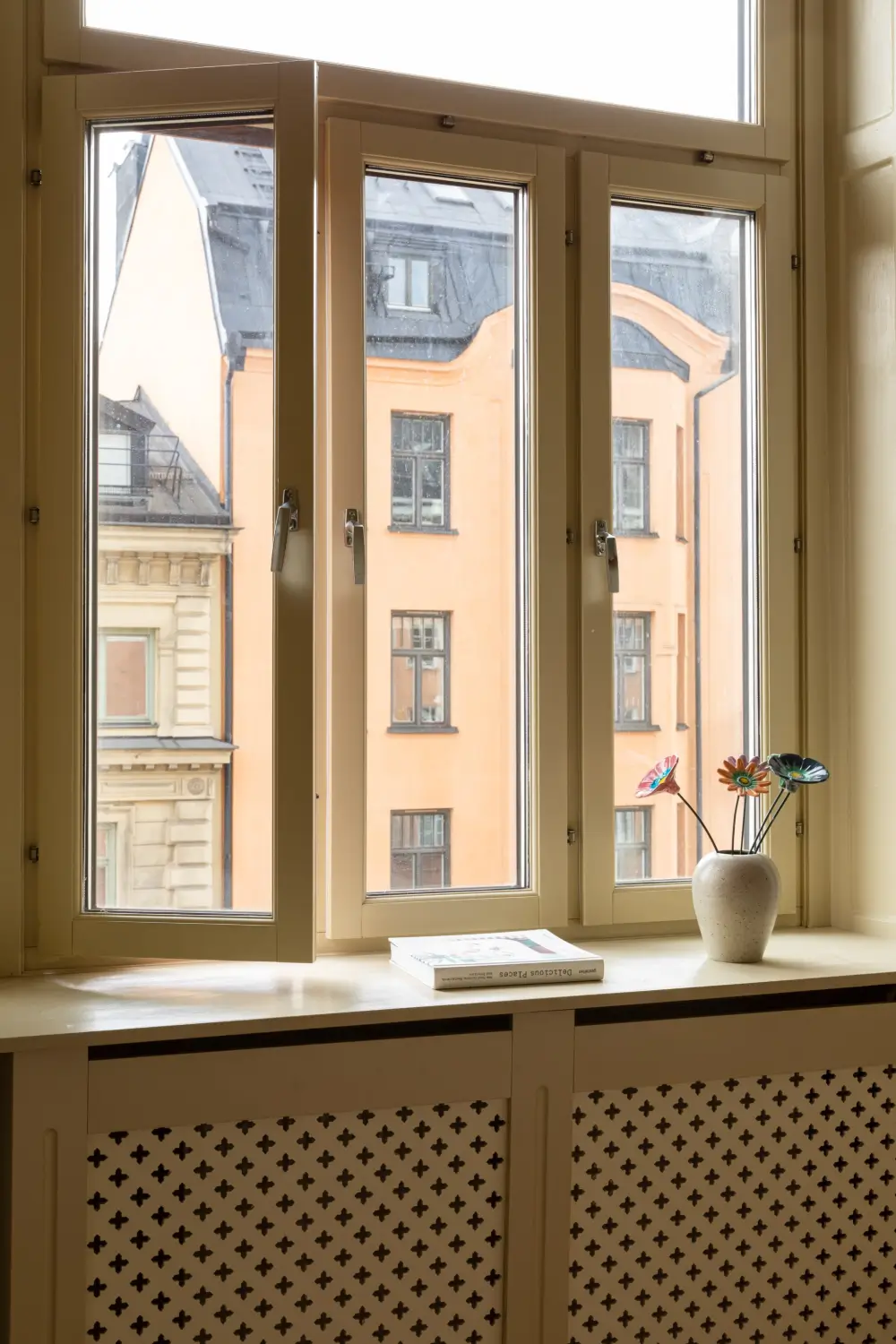 A Rich Burgundy Hall in a Stylishly Renovated Stockholm Apartment 24 butter-yellow-kitchen-period-character-stockholm-apartment-nordroom
