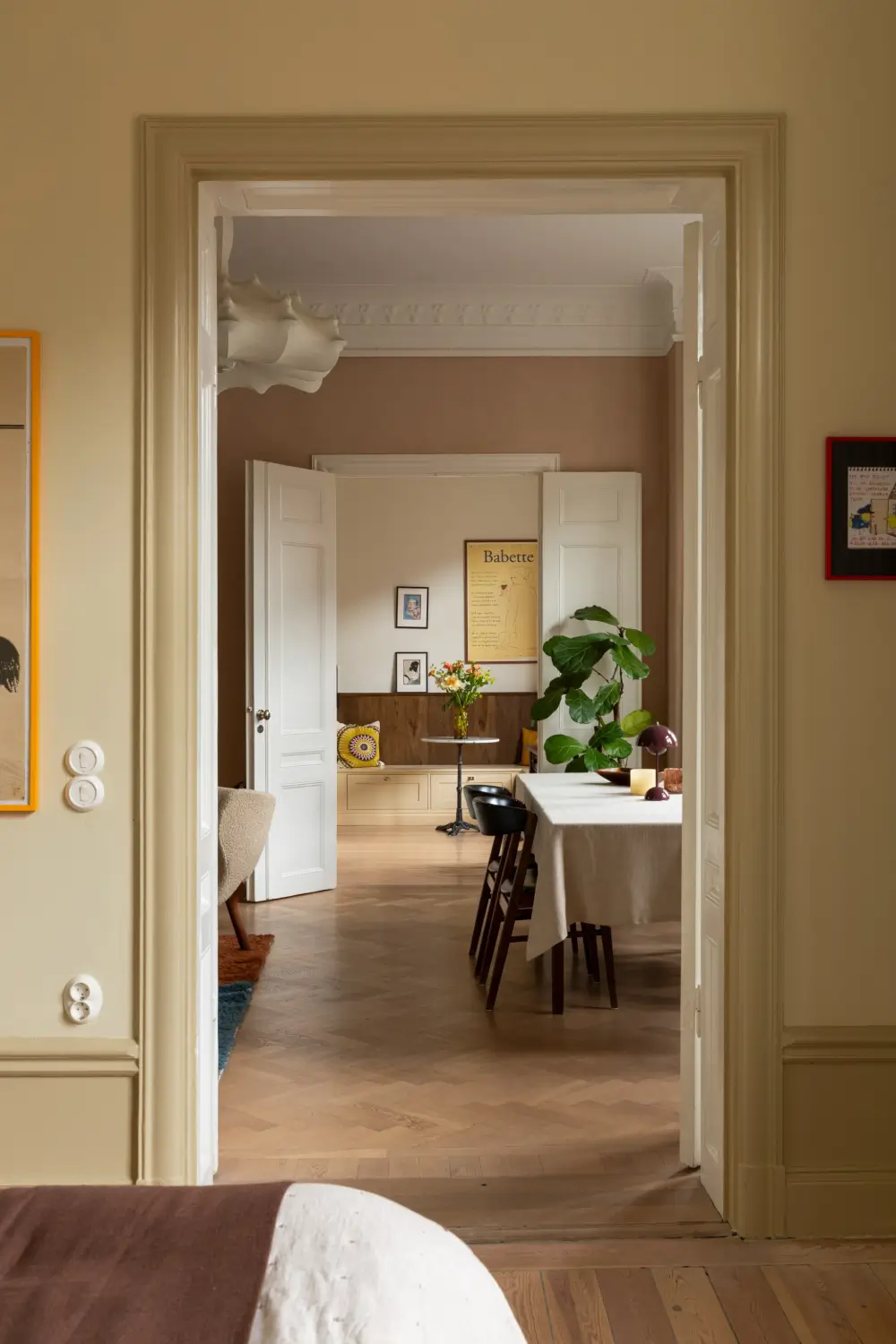 A Rich Burgundy Hall in a Stylishly Renovated Stockholm Apartment 30 butter-yellow-kitchen-period-character-stockholm-apartment-nordroom