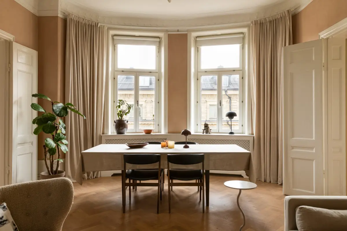 A Rich Burgundy Hall in a Stylishly Renovated Stockholm Apartment 7 butter-yellow-kitchen-period-character-stockholm-apartment-nordroom