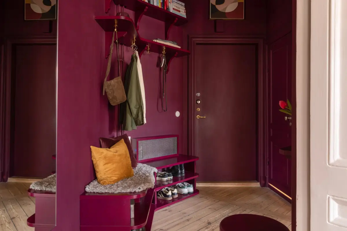 A Rich Burgundy Hall in a Stylishly Renovated Stockholm Apartment 37 butter-yellow-kitchen-period-character-stockholm-apartment-nordroom