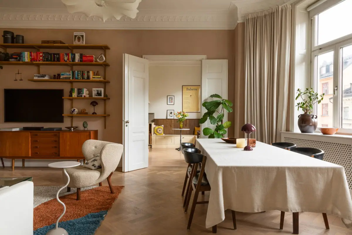 A Rich Burgundy Hall in a Stylishly Renovated Stockholm Apartment 8 butter-yellow-kitchen-period-character-stockholm-apartment-nordroom