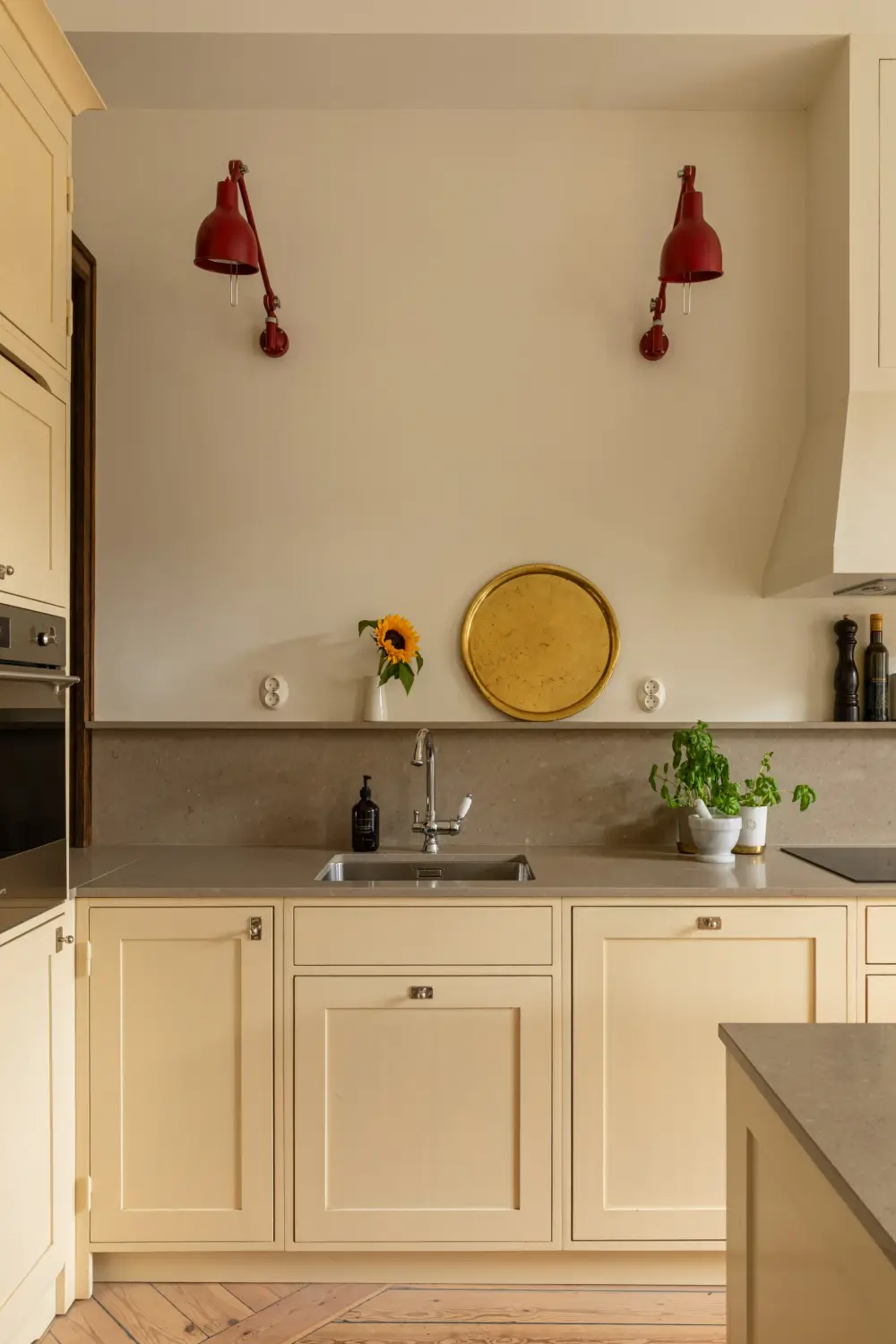 A Rich Burgundy Hall in a Stylishly Renovated Stockholm Apartment 11 butter-yellow-kitchen-period-character-stockholm-apartment-nordroom