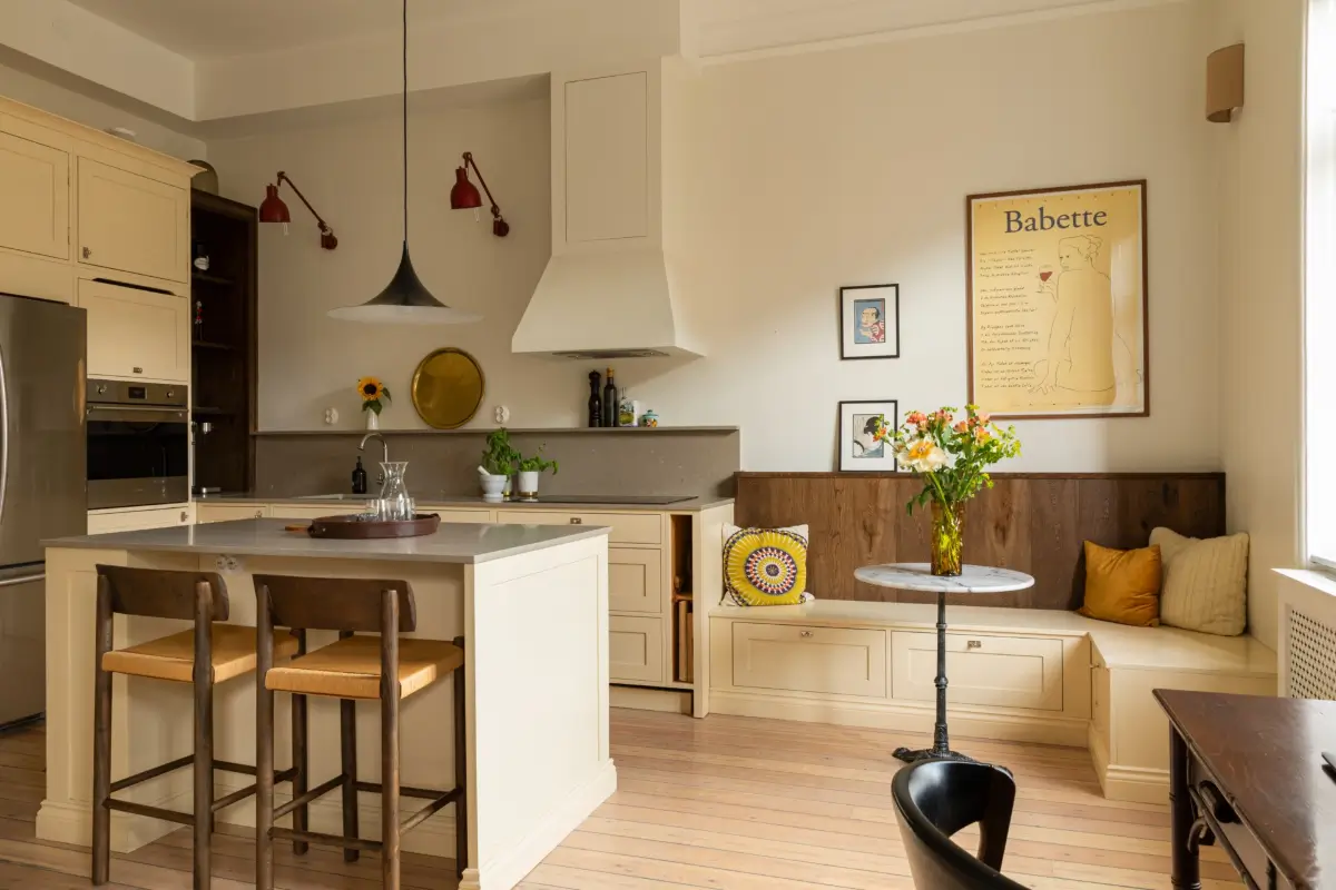 A Rich Burgundy Hall in a Stylishly Renovated Stockholm Apartment 12 butter-yellow-kitchen-period-character-stockholm-apartment-nordroom