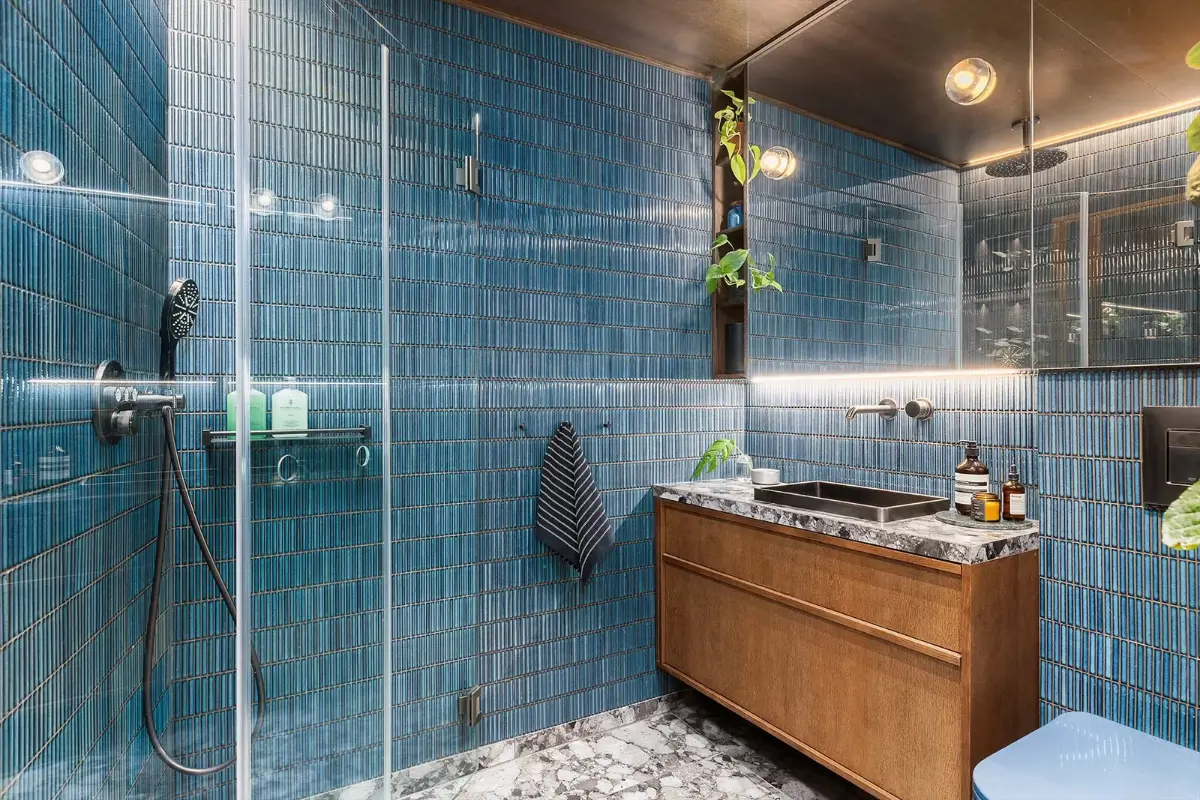 Dark Oak, Terrazzo, and Bold Colors Define This Architect-Designed Oslo Apartment 24 colorful-designer-apartment-oslo-norway