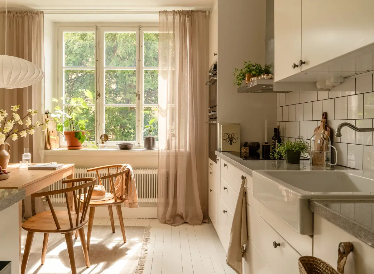 A Dividing Wall with Flea Market Windows Creates a Cozy Sleeping Niche in this Apartment 17 light-filled-turn-of-the-century-apartment-stockholm-nordroom