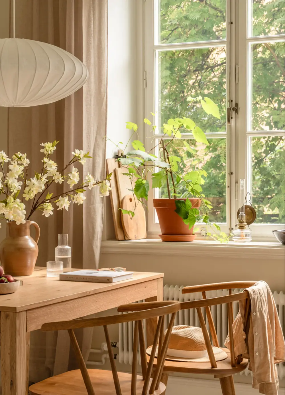A Dividing Wall with Flea Market Windows Creates a Cozy Sleeping Niche in this Apartment 26 light-filled-turn-of-the-century-apartment-stockholm-nordroom