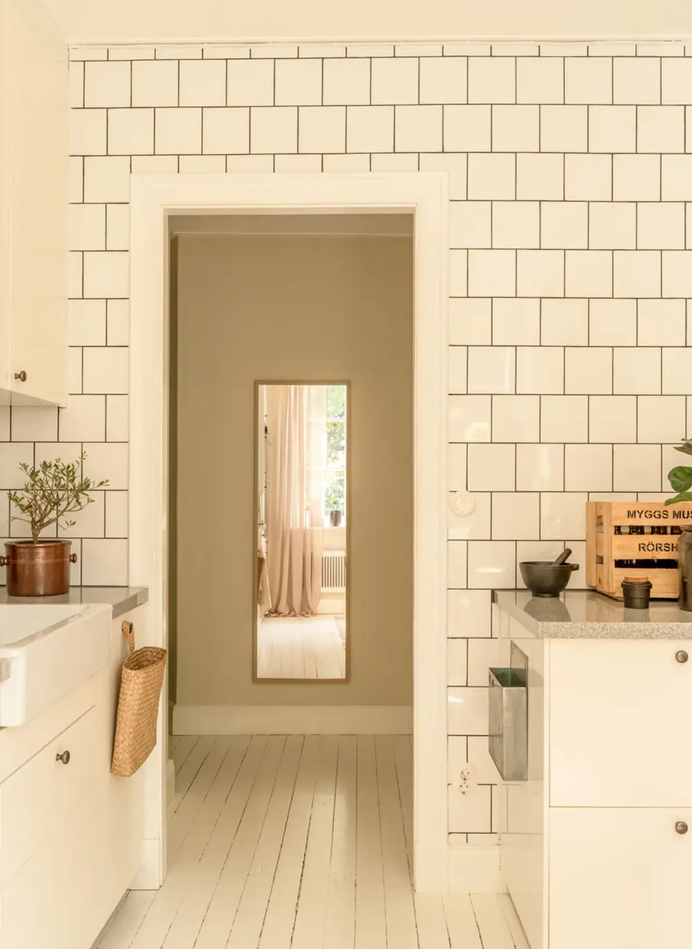 A Dividing Wall with Flea Market Windows Creates a Cozy Sleeping Niche in this Apartment 30 light-filled-turn-of-the-century-apartment-stockholm-nordroom