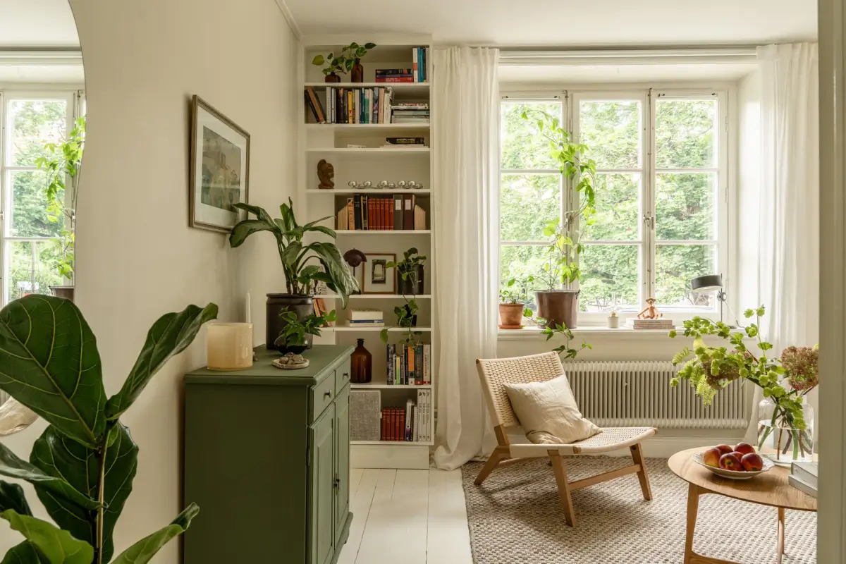 A Dividing Wall with Flea Market Windows Creates a Cozy Sleeping Niche in this Apartment 2 light-filled-turn-of-the-century-apartment-stockholm-nordroom